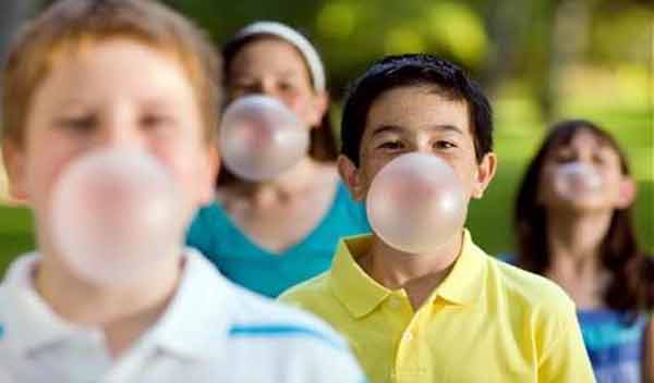 children Chewing bubble gums